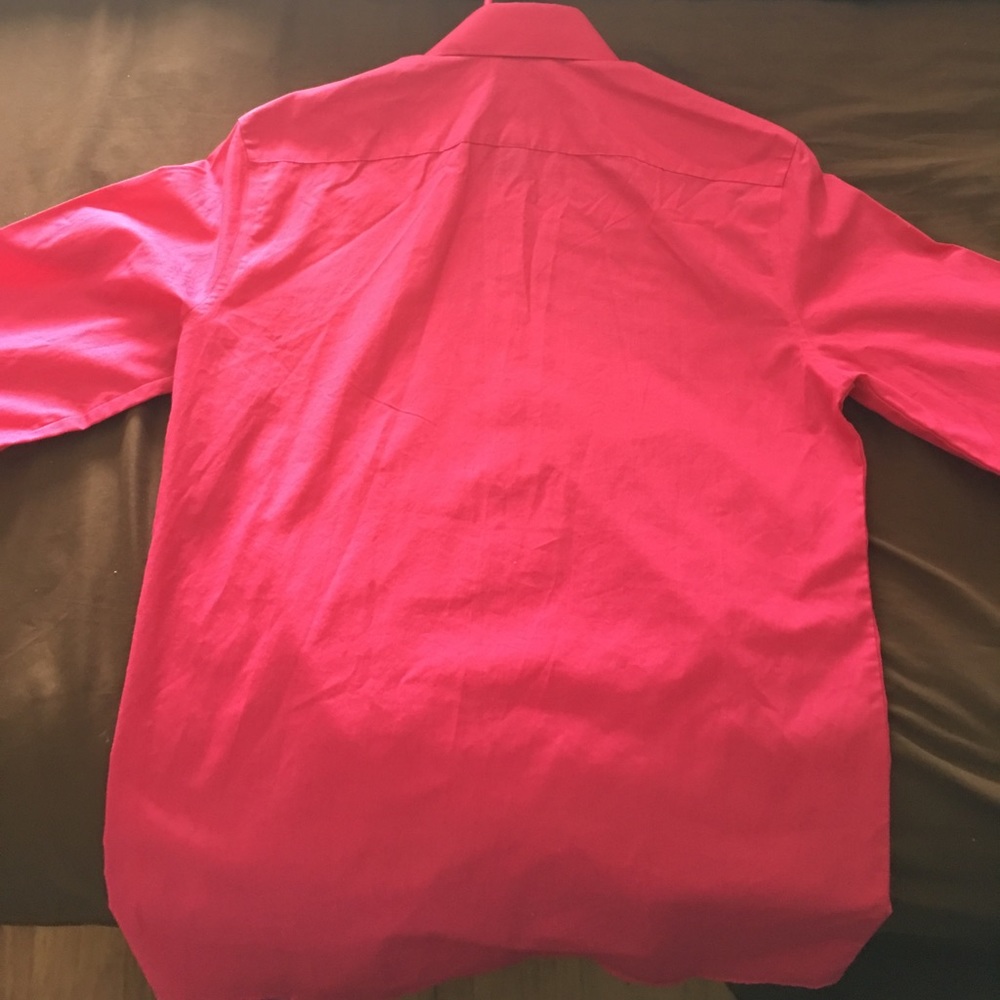 Ladies Raspberry pink long sleeve dress shirt.